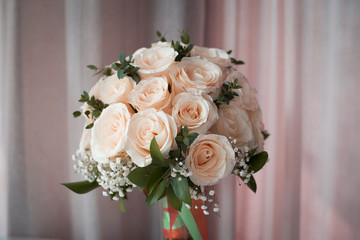 White rose flower bouquet in bundle shape for bridal in wedding ceremony