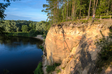 Sandstone outcrops. Erglu Cliffs, on the bank of the Gauja river. - 193005986