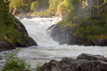 Waterfall in northern Finland in summer.