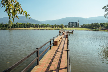Fototapeta premium The bridge across lake with castle.