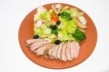roasted duck slices with salad