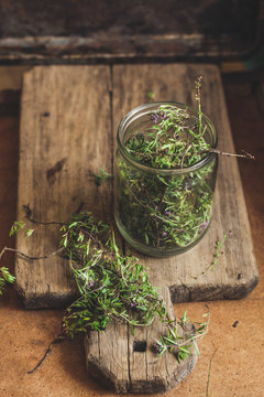 thyme - herb spices - new harvest on a wooden surface (collect and dry)