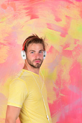 American handsome bearded guy with headphones.