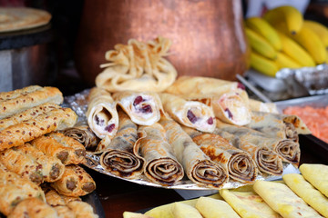 Many pancakes are stacked for breakfast and Shrovetide.