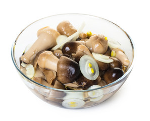Pickled mushrooms in a glass bowl