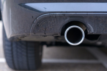 Low angle view of the exhaust pipe of a car