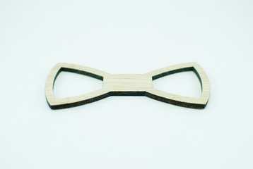 Wooden shape of bow tie. Hipsterish style 