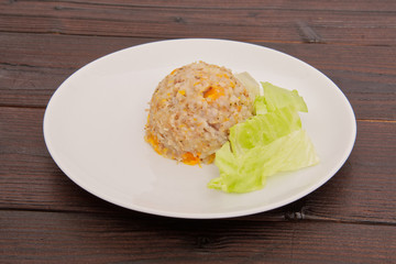 Buckwheat risotto with pumpkin on a table