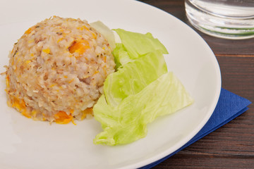 Buckwheat risotto with pumpkin on a table