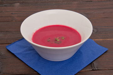 Beetroot creme soup on a table