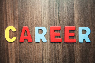 Colorful word Career on wooden background.