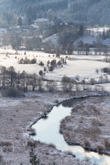 Tepla River in beautiful snowy winter landscape near Cihelny before Brezova dam, Karlovy Vary,...
