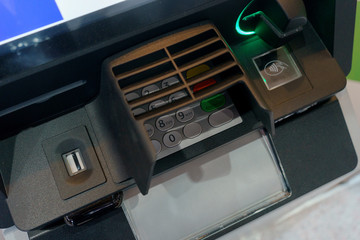 Front ATM panel with a keyboard for entering a password, a fingerprint scanner and a wireless connection. 