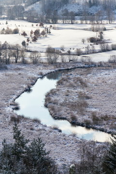 Tepla River in beautiful snowy winter landscape near Cihelny before Brezova dam, Karlovy Vary, Czech Republic, sunny day