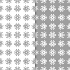White and gray floral backgrounds. Set of seamless patterns