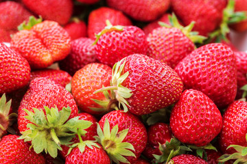 Fresh ripe strawberry red fruits, seasonal healthy and vitamin food, natural background