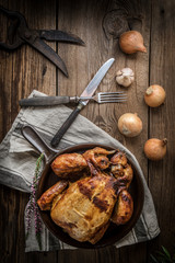 Roasted chicken on plate.