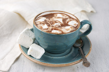 Hot chocolate with whipped cream and marshmallow