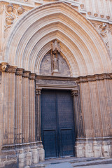 Fototapeta na wymiar The Cathedral of the Holy cross and Saint Eulalia. The Cathedral was built in Gothic style from 13th to 15th century in the Gothic quarter of Barcelona