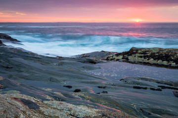 Sunrise at coastline nearby Pemaquid Point lighthouse, Maine, USA