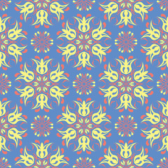 Floral seamless pattern. Blue background with colored flower elements
