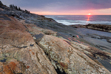Sunrise at coastline nearby Pemaquid Point lighthouse, Maine, USA