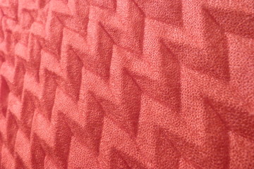 red natural fabric close-up background for decoration backdrop cotton ribbon coarse cloth scarlet color crumpled fabric abstract pattern texture pink silk