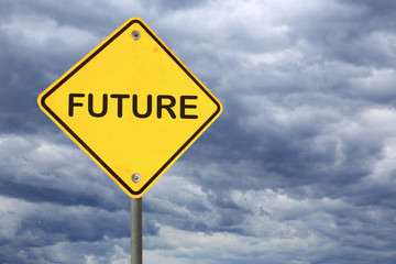 yellow warning road sign with text FUTURE against stormy clouds