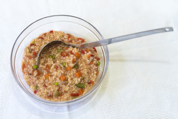 boiled rice with vegetables served on the table