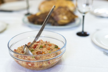 boiled rice with vegetables served on the table
