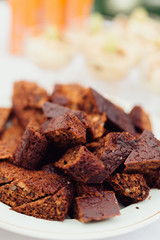 Assortment of sweet baked goods on beautiful trays