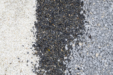 Colorful mosaic pebble in white, gray, black