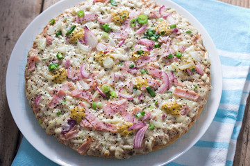 French creme from age pizza with red onion, ham, mustard honey sauce