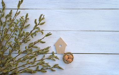 Branches on old wooden boards. Top view. A symbol of the rebirth of nature.