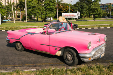 Hot pink Classic car, Cuba, Havana.