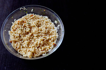 Instant noodles on wood baord