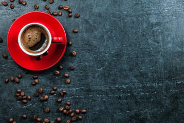 Obraz na płótnie Canvas Coffee cup background with coffee beans top view.