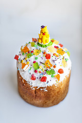 Easter cake with dried fruits on light background.