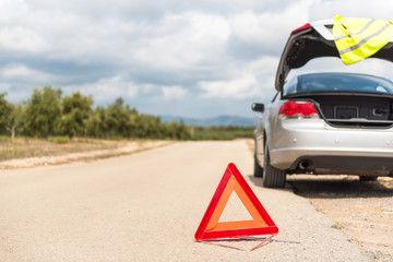 The car broke down on the road. Emergency sign close-up on the road, Tarragona, Catalunya, Spain. © ggfoto