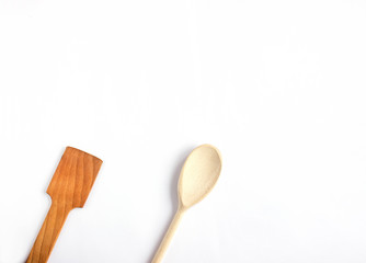 Wooden kitchen utensils isolated on white