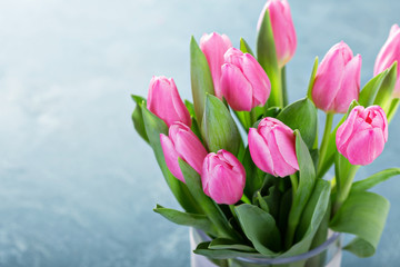 Pink tulips in a glass vase