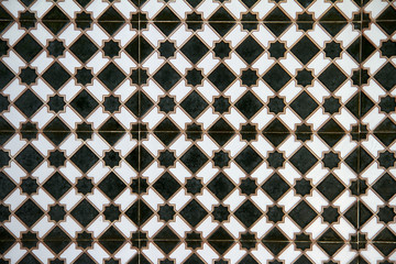 Azulejos / fondo de azulejos Árabe formando un mosaico de estrellas y rombos verde, típico de Marruecos 