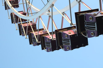 a Ferris wheel on a summer attraction