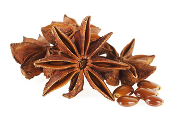 Anise stars and seeds isolated on a white background