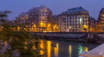 Fototapeta na wymiar Grenoble with Isere river at twilight