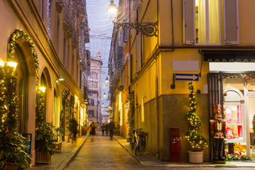 Streets of night Parma with Christmas illumination in Italy