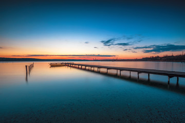 Naklejka na ściany i meble Sunset Over the lake HDR Image