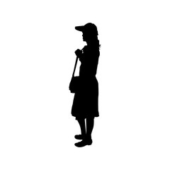 Silhouette of young woman with bag.
