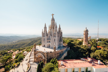 Tibidabo church on mountain in Barcelona with christ statue