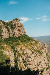 A mountain view with monastery on the top in Montserrat, Spain